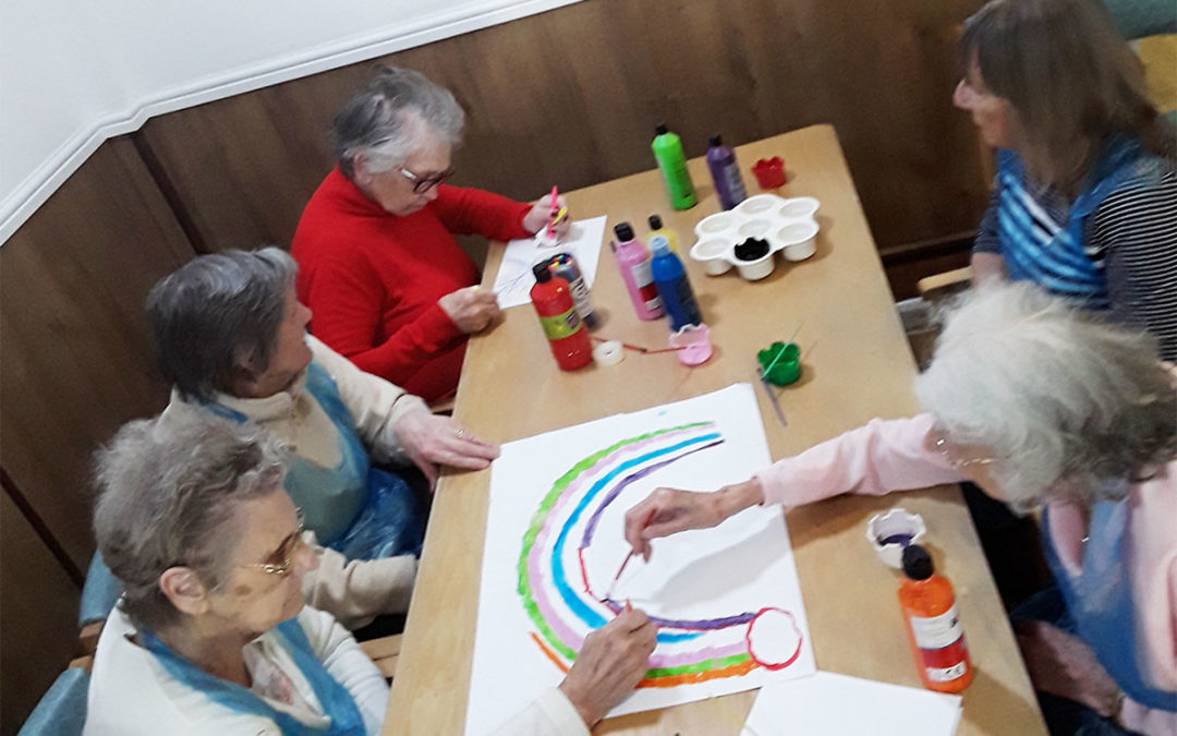 Making window rainbows at Sonya Lodge Residential Care Home