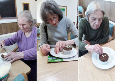 Sonya Lodge Residential Care Home residents decorating cupcakes with icing and chocolate chips