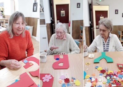 Sonya Lodge Residential Care Home residents making a colourful boy or girl baby banner