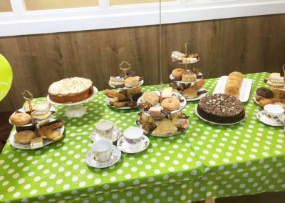 A table spread with different cakes for a tea party at Sonya Lodge Residential Care Home