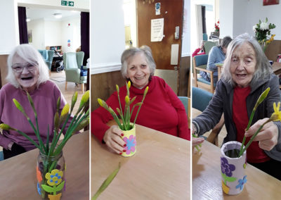 Residents arranging daffodils at Sonya Lodge Residential Care Home