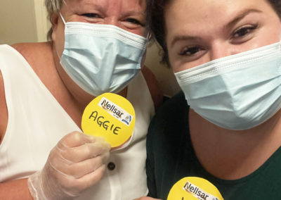 Sonya Lodge Residential Care Home staff showing off their Kim and Aggie badges