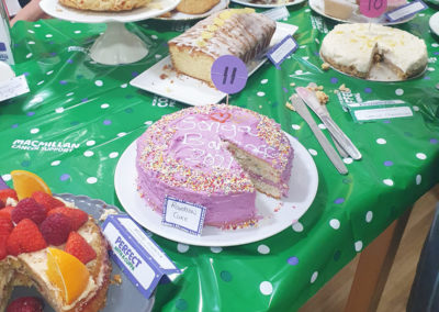 Table of Bake Off cakes for judging at Sonya Lodge Residential Care Home