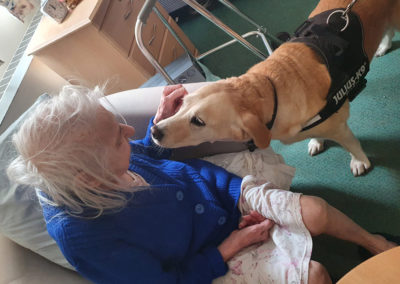 Sonya Lodge Residential Care Home resident with PAT dog Lois