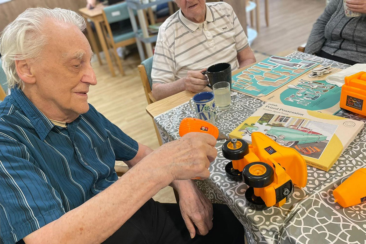 Constructing toys and puzzles at Sonya Lodge Residential Care Home