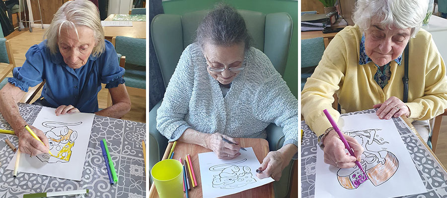 Sonya Lodge Residential Care Home residents colouring themed pictures on National Cheese Lovers Day