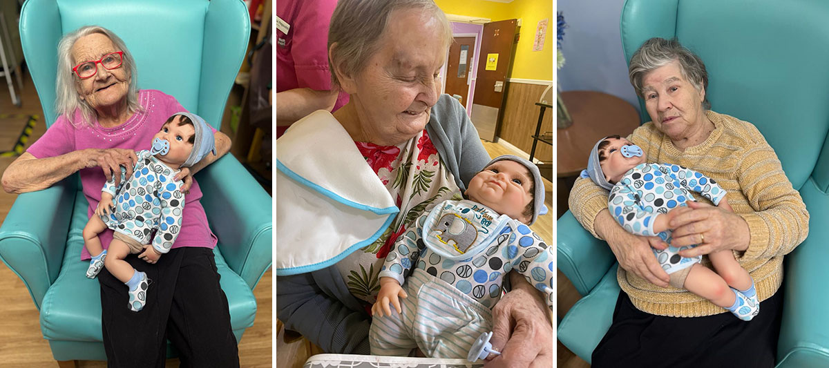 Sonya Lodge Residential Care Home residents enjoying baby dolls