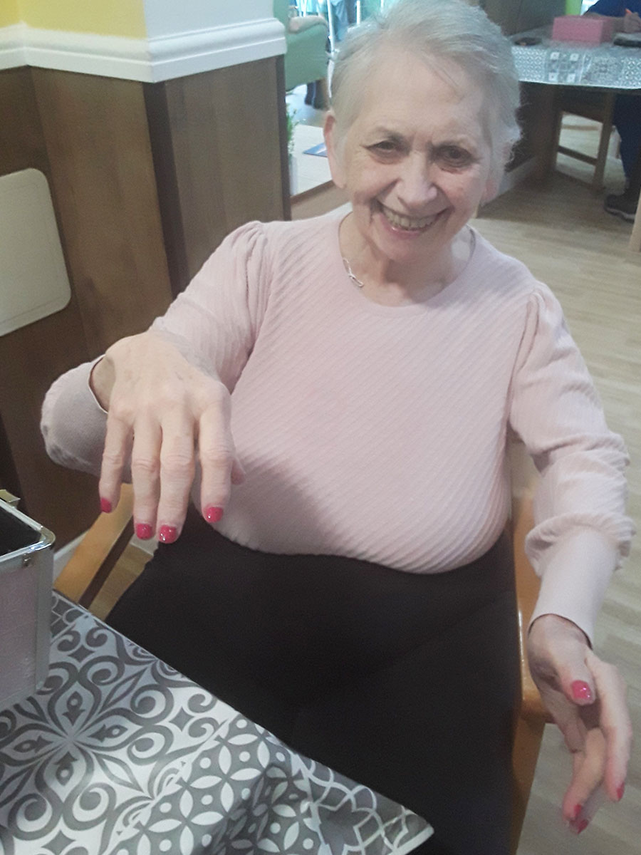 Maggie enjoying her manicured nails at Sonya Lodge Residential Care Home