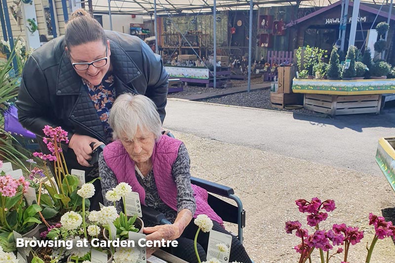 Sonya Lodge residents browsing plants at a local garden centre Sonya Lodge residents browsing plants at a local garden centre