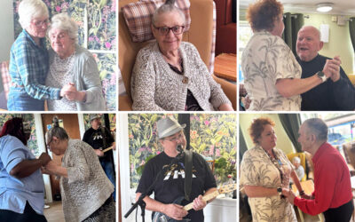 Residents and staff at Sonya Lodge Residential Care Home enjoying a lively musical performance by entertainer Rob T, with dancing, smiles, and a joyful atmosphere.