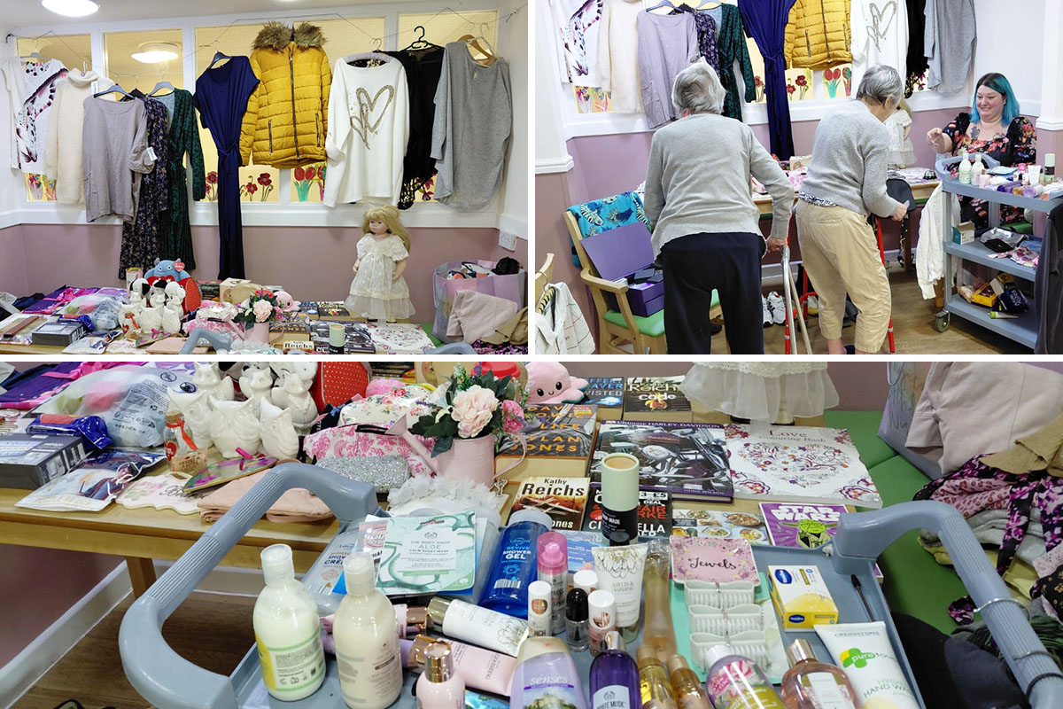 Tables filled with clothes, books, gifts and toiletries at Sonya Lodge Residential Care Home’s tabletop sale, with residents browsing and enjoying their in-house shopping experience.
