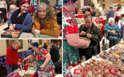 Residents from Sonya Lodge enjoying the festive atmosphere at a Christmas Fair, browsing crafts, chatting with stallholders, and sharing cakes and hot drinks together.