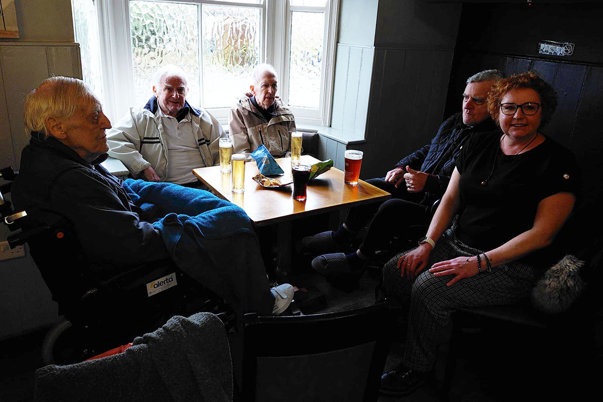 Sonya Lodge residents enjoying time out in the community, spending time together at a local pub.