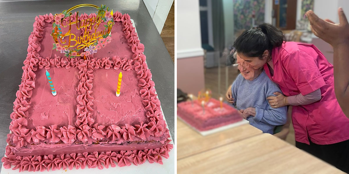 Sonya Lodge resident Jean with a team member, receiving her pink birthday cake.
